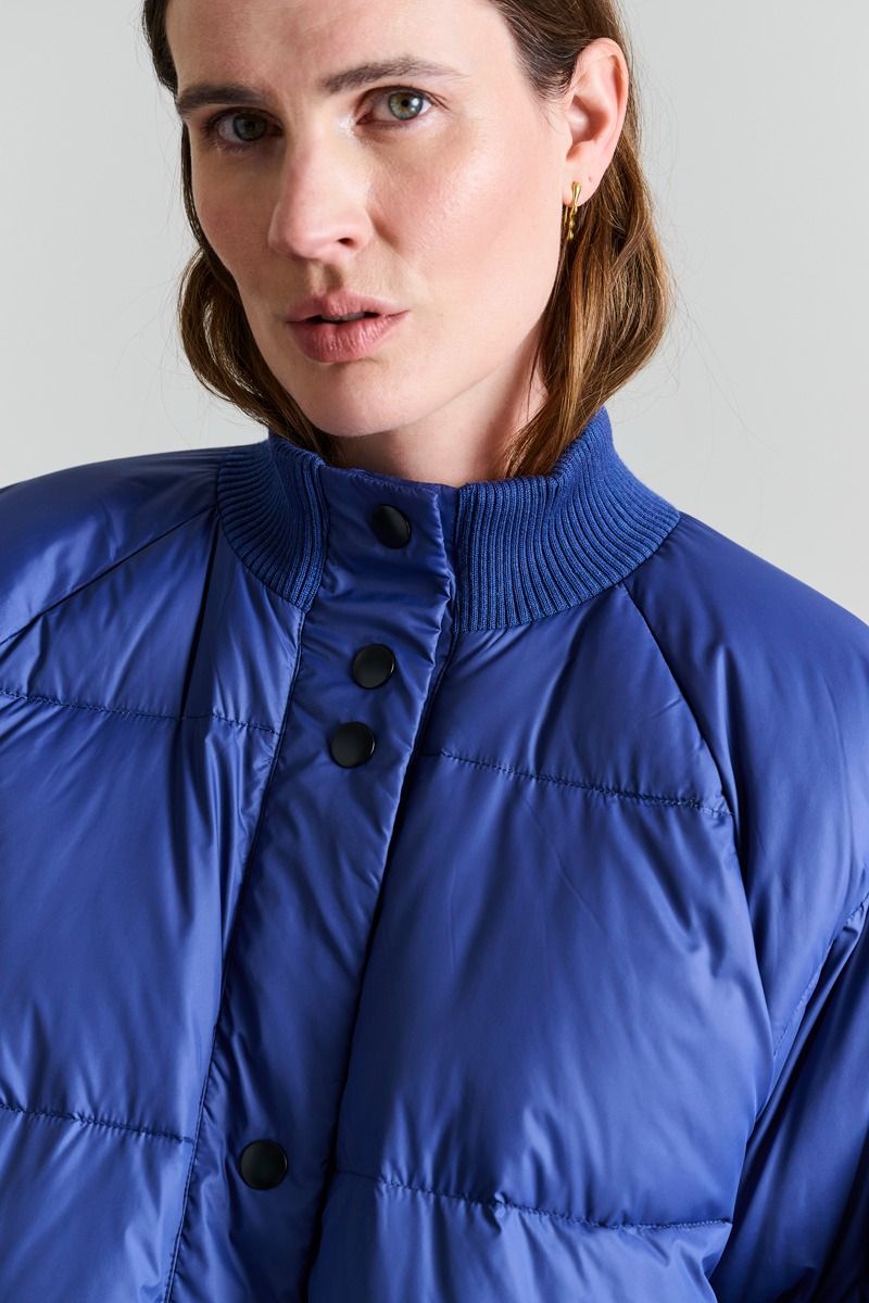 Feather down kappa med knappar